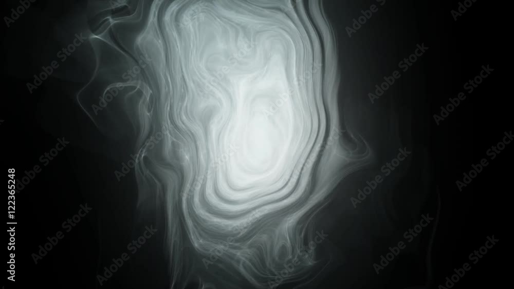 A 15 second loop of an eerie abstract matter floating over black background.