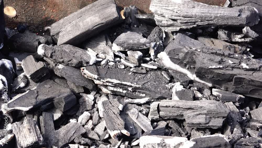Scatter ashes and fire mixed with smoke in the wind from the hot coals Scatter ashes and fire mixed with smoke in the wind from the hot coals