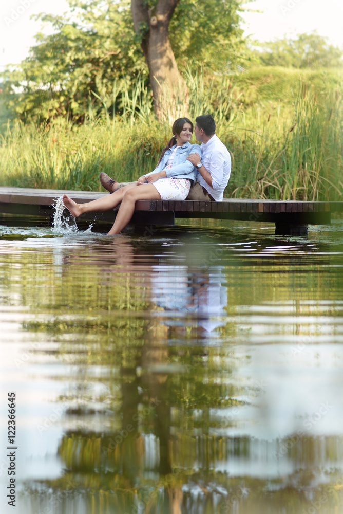 Romantic couple on pontoon