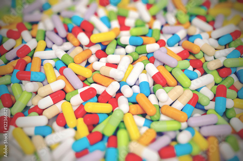 Colorful Vitamin Tablet - 3D illustration