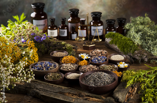 Natural medicine on wooden table background