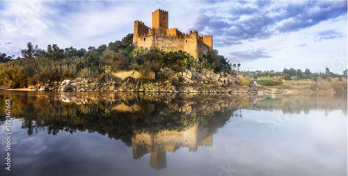 Almourol castle - reflection of history. medieval castle of Templars, Portugal photo