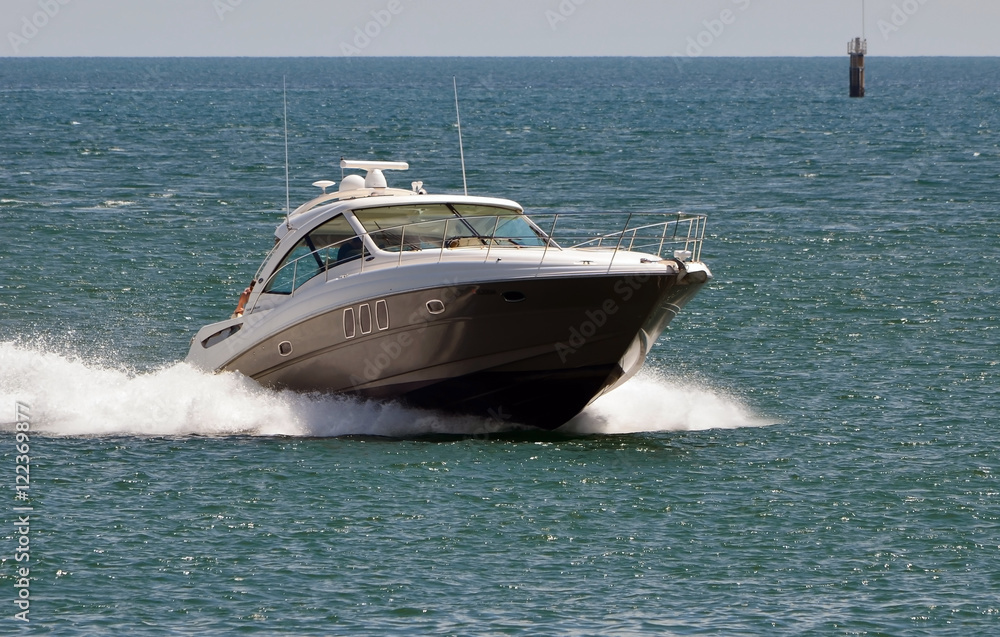 Upscale Cabin Cruiser Speeding on Government Cut Upscale Cabin Cruiser Speeding on Government Cut