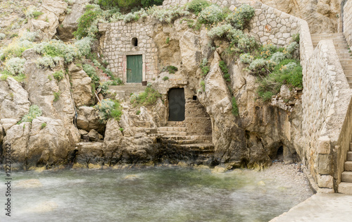 The doorways and staircases in the medieval city walls beneath Fort Lovrijenic in Dubrovnik, Croatia. photo