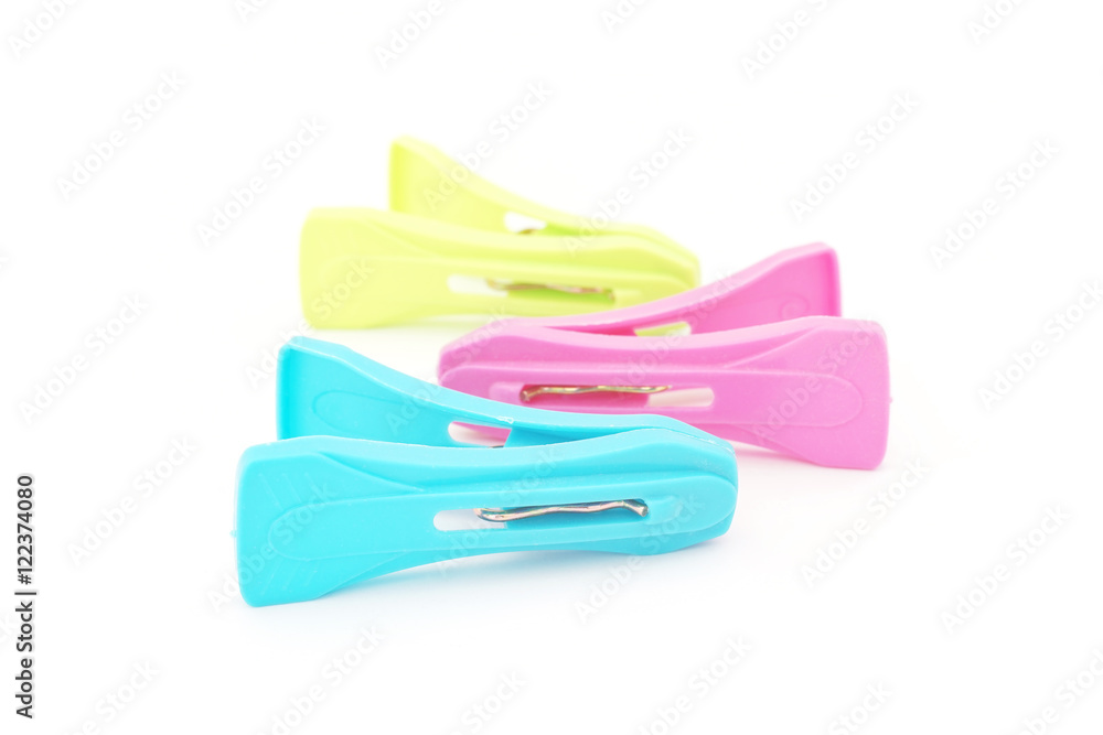 plastic clothespins on white background plastic clothespins on white background