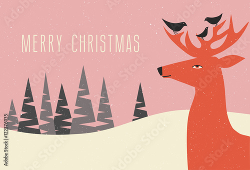 christmas greeting card winter scene with deer and birds perched on his antlers 