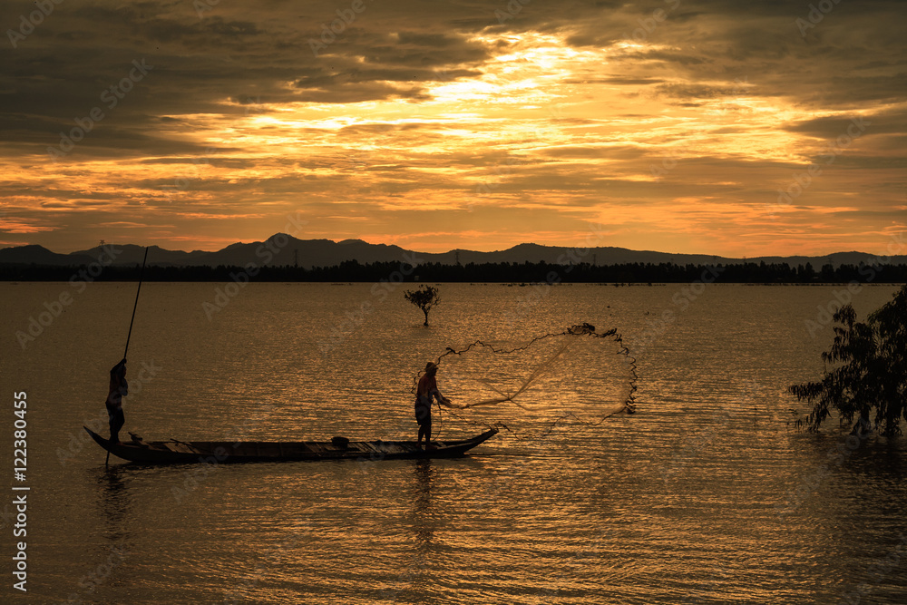 Fishing in the flood season, Chau Doc, An Giang. The annual floods (between Aug and Nov) carry nutrient-rich silt to farmland around the river and provide the moisture needed to grow fields of rice.