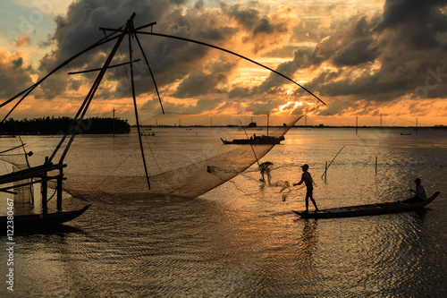 Wallpaper Mural Fishing in the flood season, Chau Doc, An Giang. The annual floods (between Aug and Nov) carry nutrient-rich silt to farmland around the river and provide the moisture needed to grow fields of rice. Torontodigital.ca