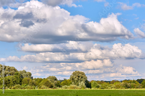 Terraces of summer clouds over country side