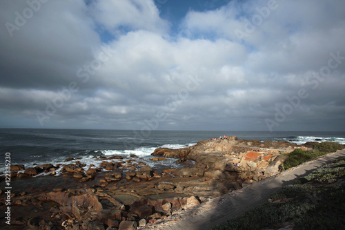 rocky beach with cloudy sky in South Africa