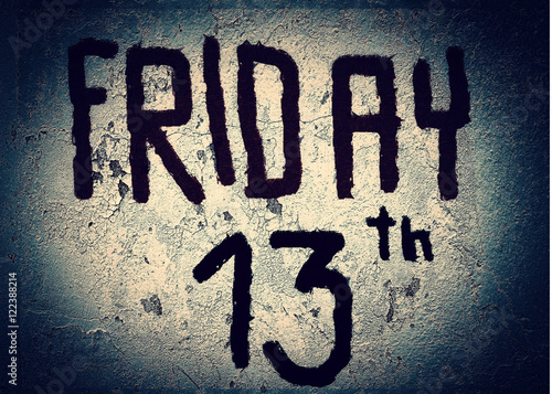 Friday 13th writing on black grunge background