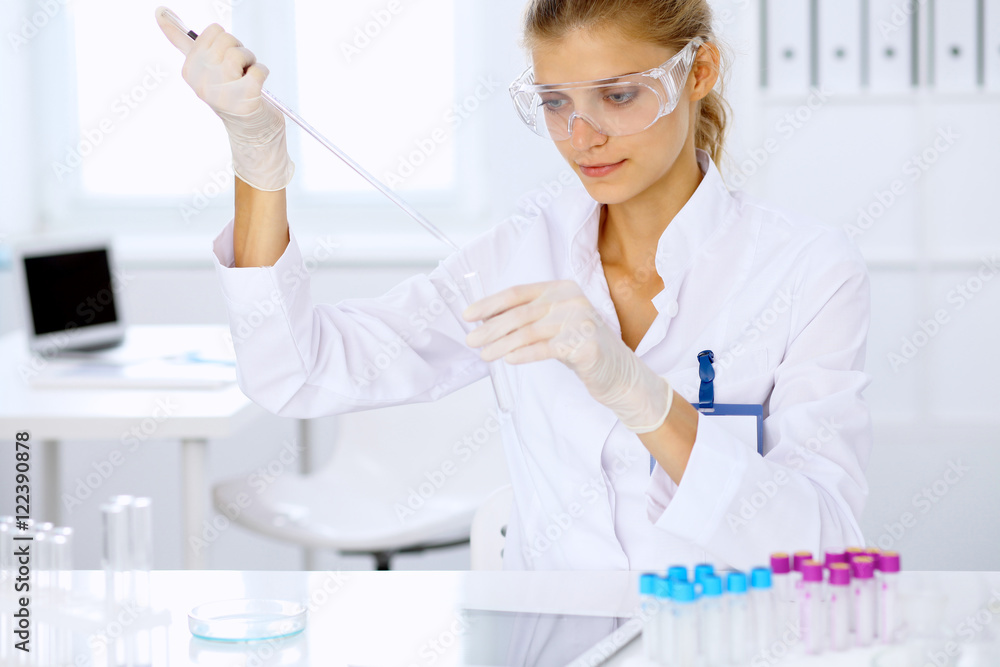 Female scientific researcher in laboratory Female scientific researcher in laboratory