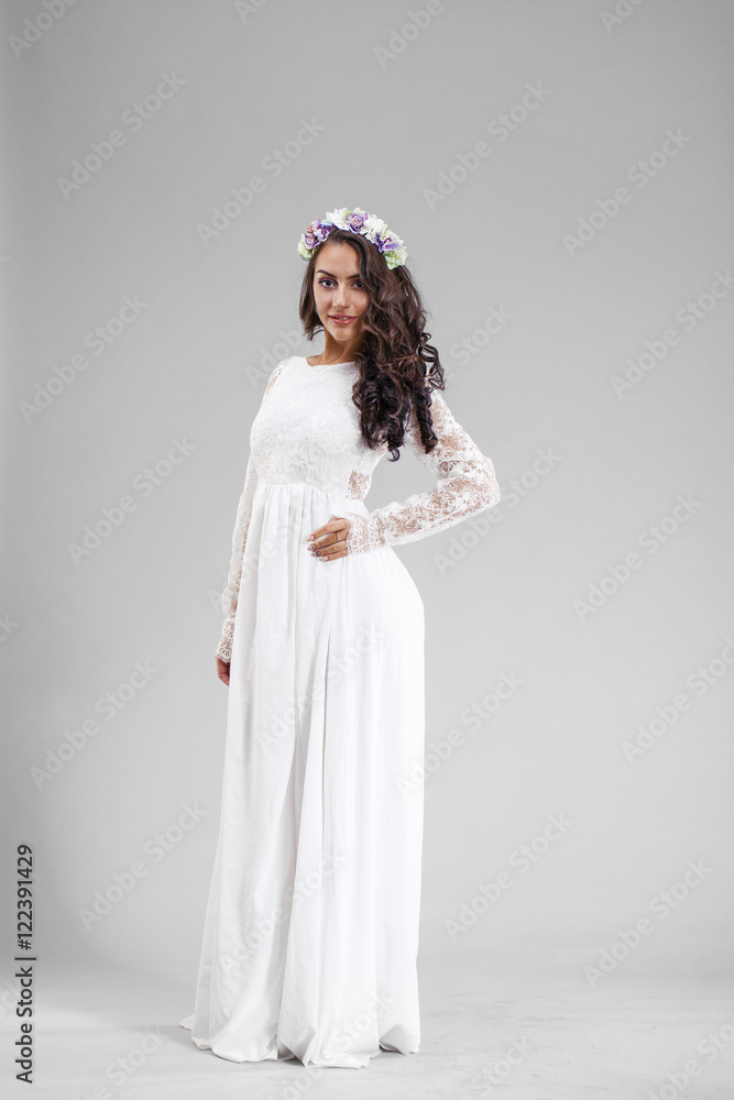Young arabic woman in white sexy dress