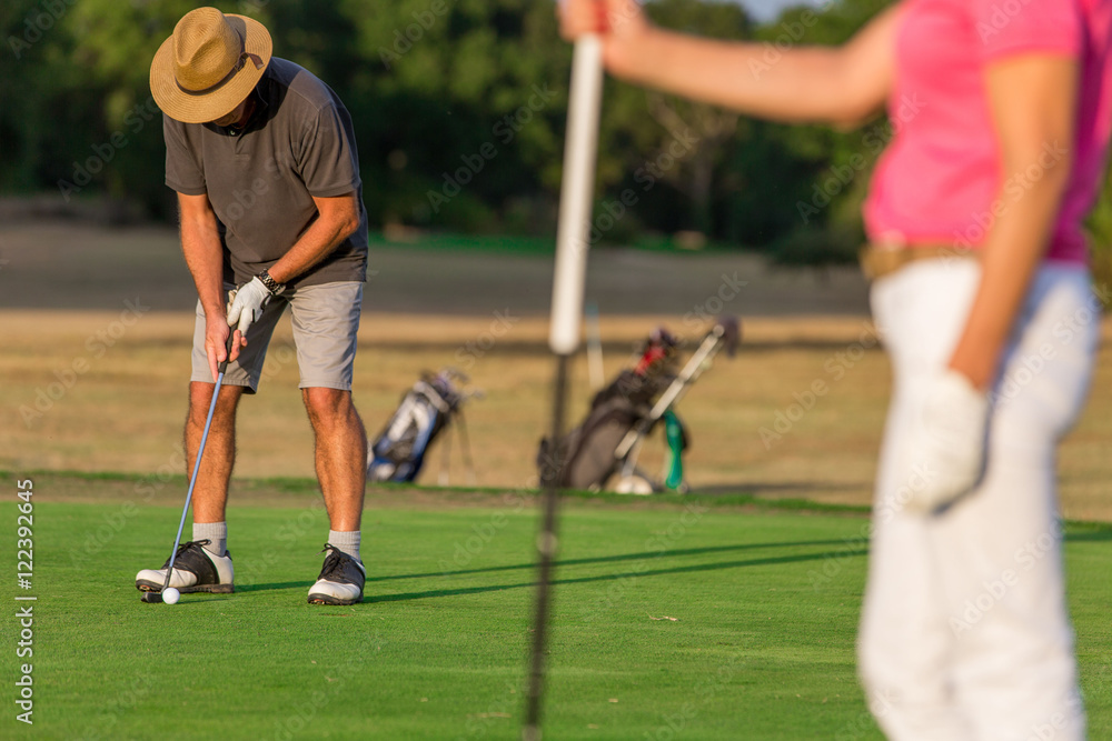 Happy Senior Couple Playing Golf Happy Senior Couple Playing Golf