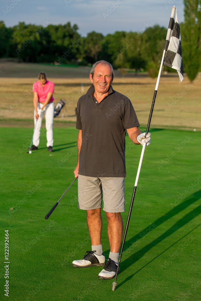 Fototapeta premium Happy Senior Couple Playing Golf