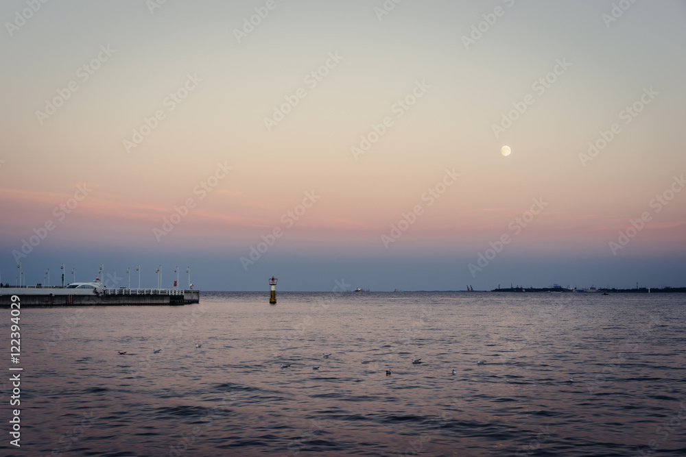 Quiet evening with full moon by the bay of Gdansk, Pomeranian, Poland