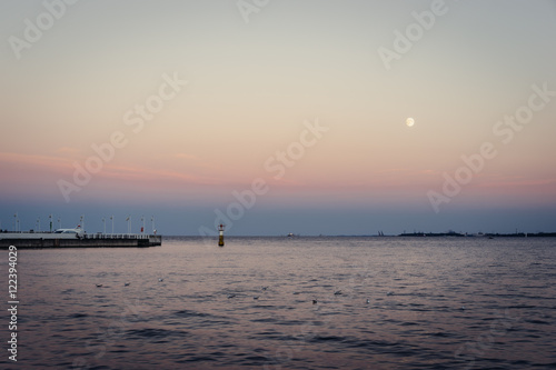Quiet evening with full moon by the bay of Gdansk, Pomeranian, Poland