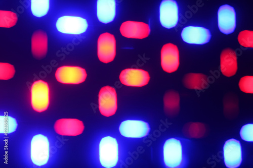 Beautiful multi-colored reflections in the form of glowing bokeh of night lights