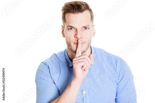 Top Secret - Geschäftsmann mit Finger vor Mund