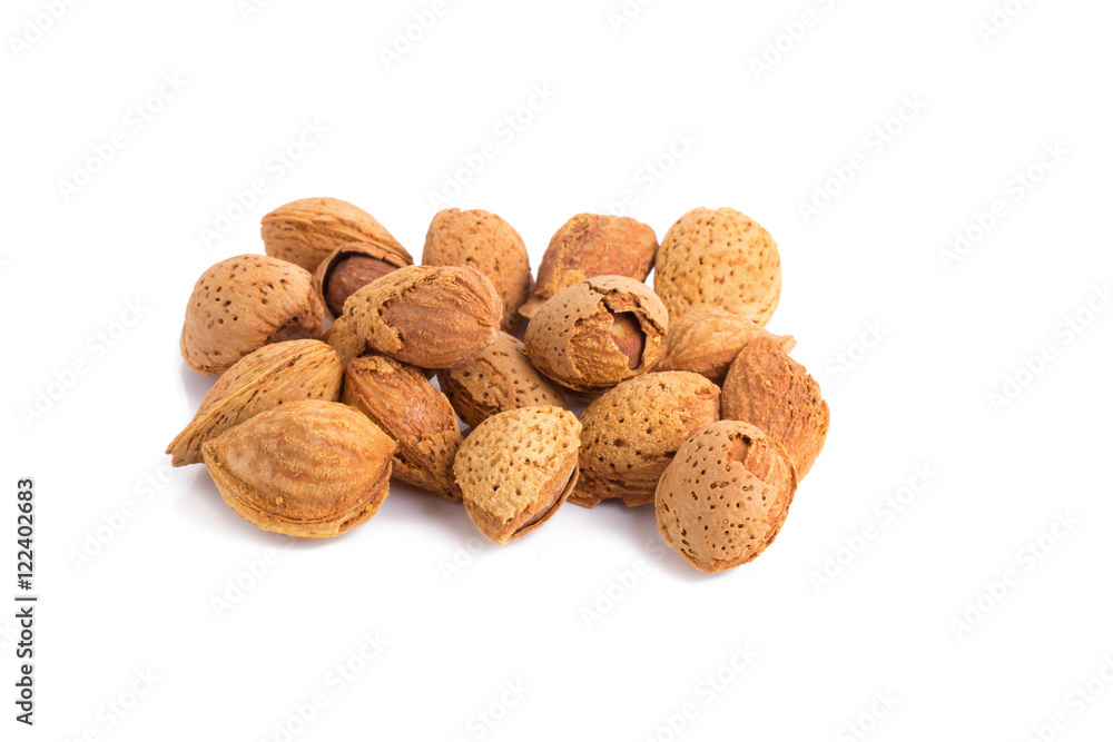 Almond nut in shell and shelled isolated on white background Almond nut in shell and shelled isolated on white background