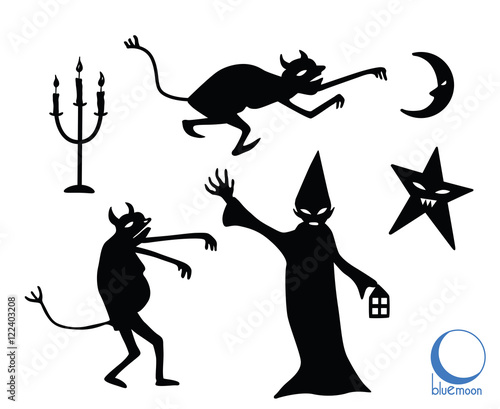 halloween sorcerer or witch with devil creature monsters and chandellier photo