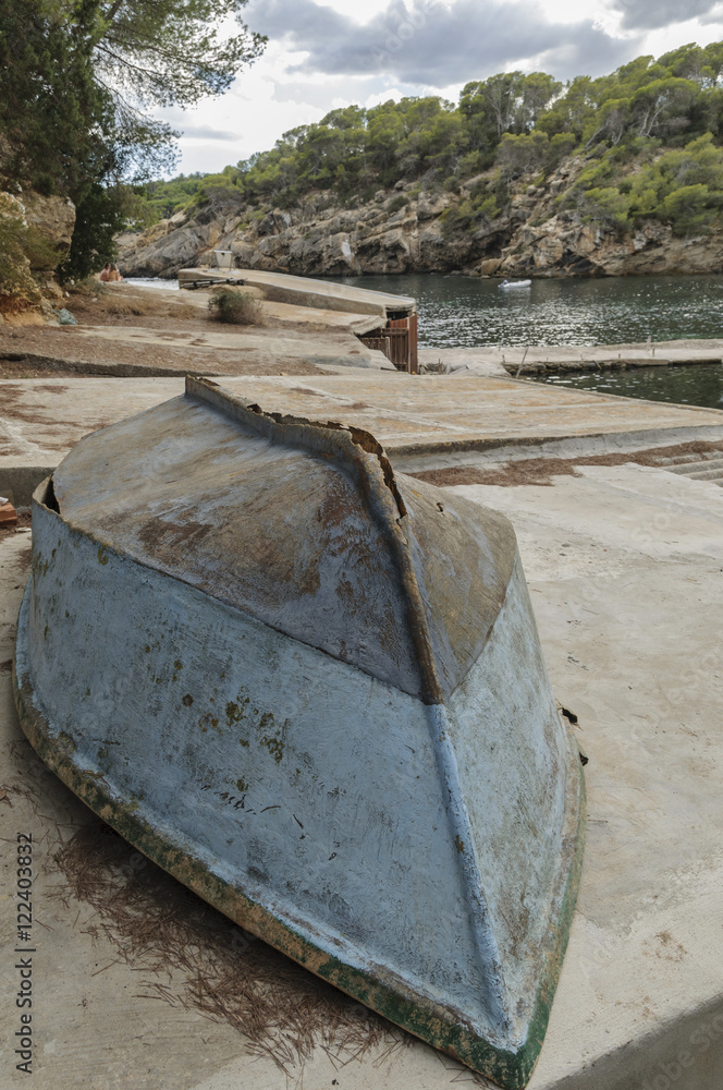 broken boat at the pier,.Spain, Ibiza broken boat at the pier,.Spain, Ibiza