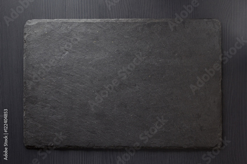 black slate stone on wooden