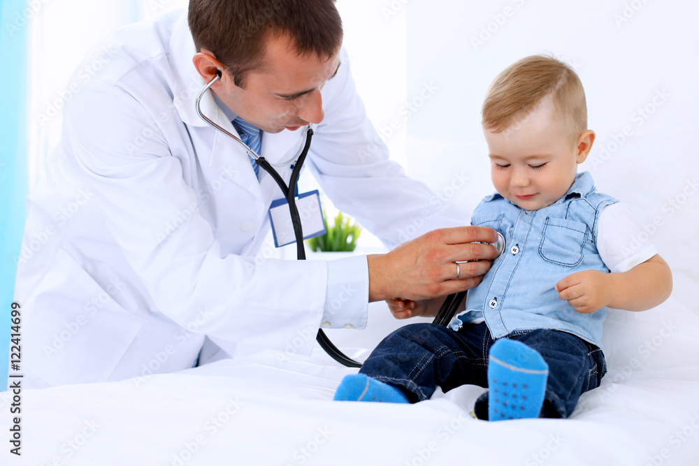 Doctor examining a child patient by stethoscope Doctor examining a child patient by stethoscope