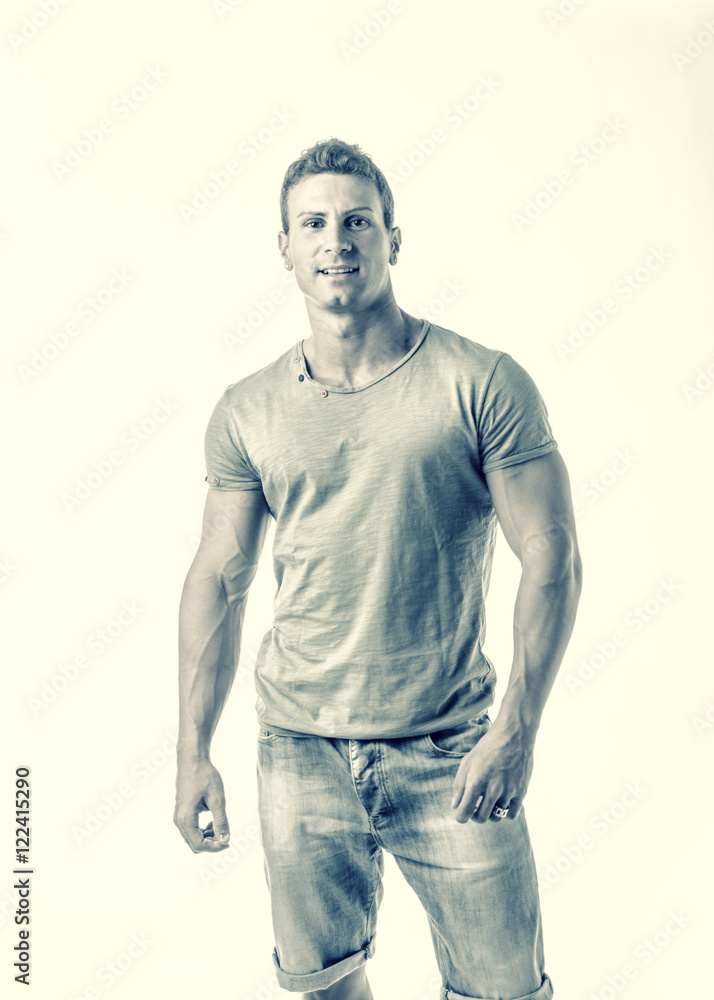 Handsome young man isolated on white background looking at camera with a smile. Filtered photo Handsome young man isolated on white background looking at camera with a smile. Filtered photo