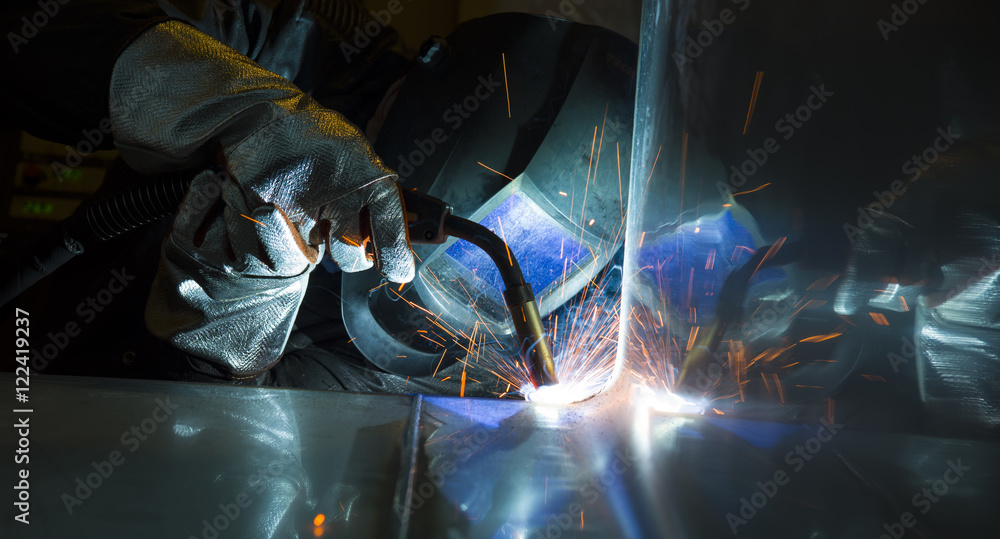 Industrial steel welder in factory Industrial steel welder in factory
