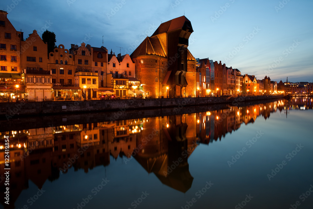 City skyline of Gdansk at evening in Poland, Old Town with reflection on Motlawa River