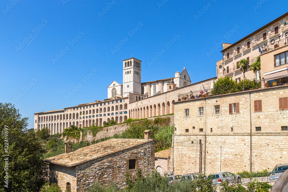 Assisi, Italy. Urban landscape with the Basilica of St. Francis, XIII century.