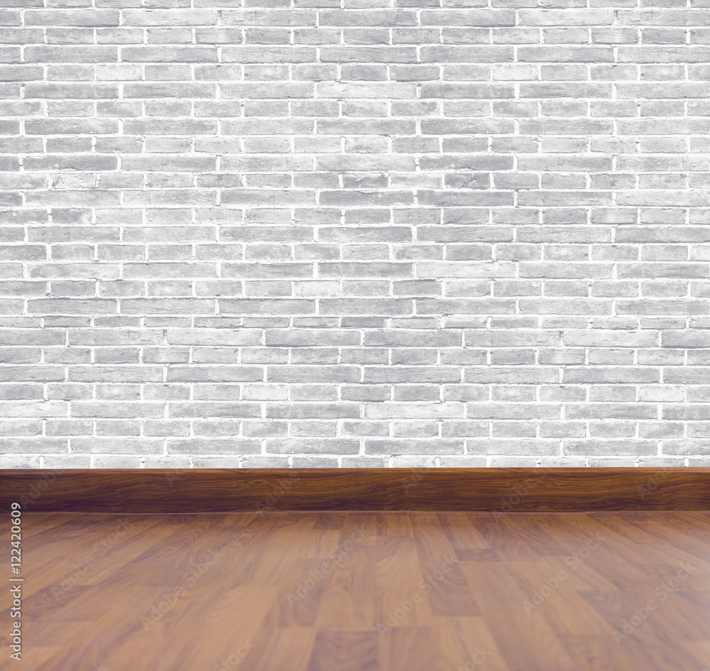 brick wall with wooden floor