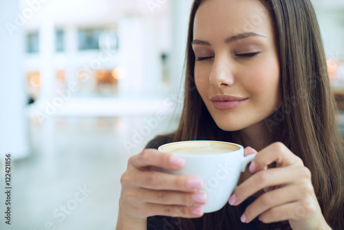 Elegant woman in a coffee break