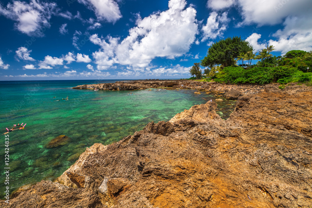 Scenic landscape of Sharks Cove, Hawaii, a small rocky bay side of Pupukea Beach Park. Sharks Cove is the second best snorkeling site on Oahu, North Shore, and boasts an impressive amount of sea life.
