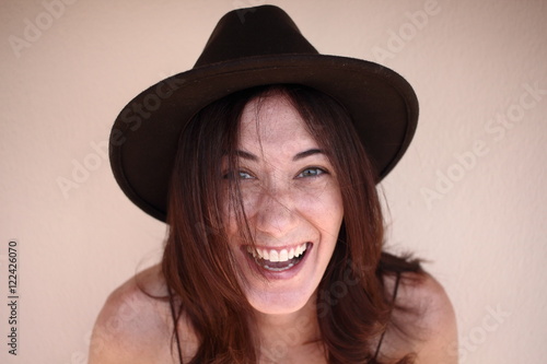 Portrait of a cheerful beautiful woman smiling and feeling happy