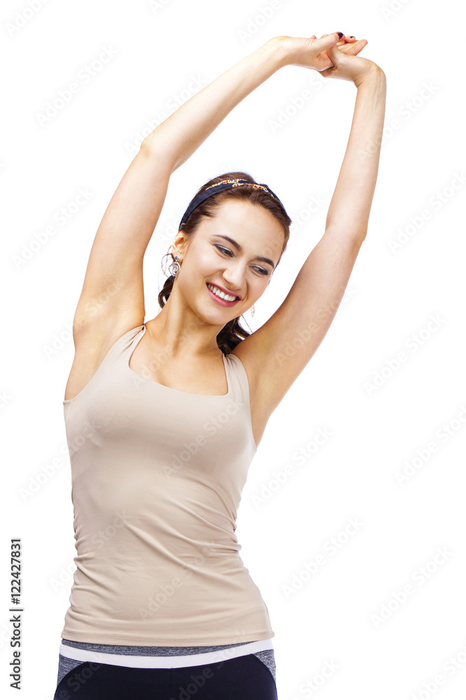 Young beautiful brunette woman in beige sports vest Young beautiful brunette woman in beige sports vest