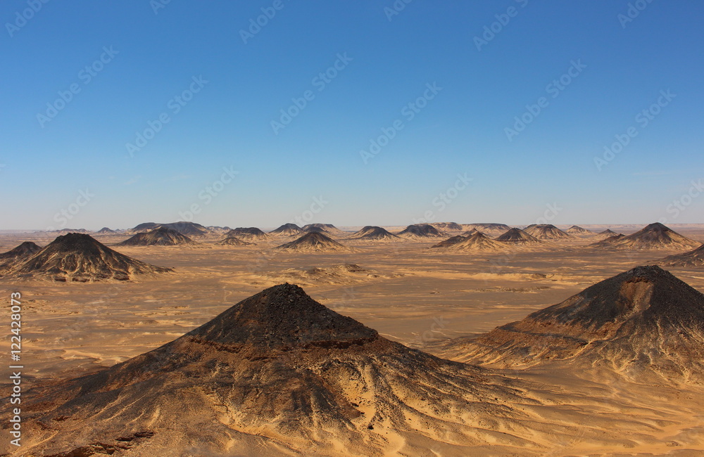 Panoramic view of the black desert mountains close to Bahariya Oasis, Egypt