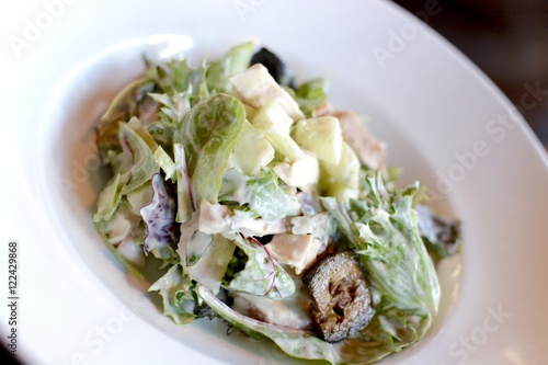 Waldorf salad with lettuce, apple, pickled walnut in a creamy dressing