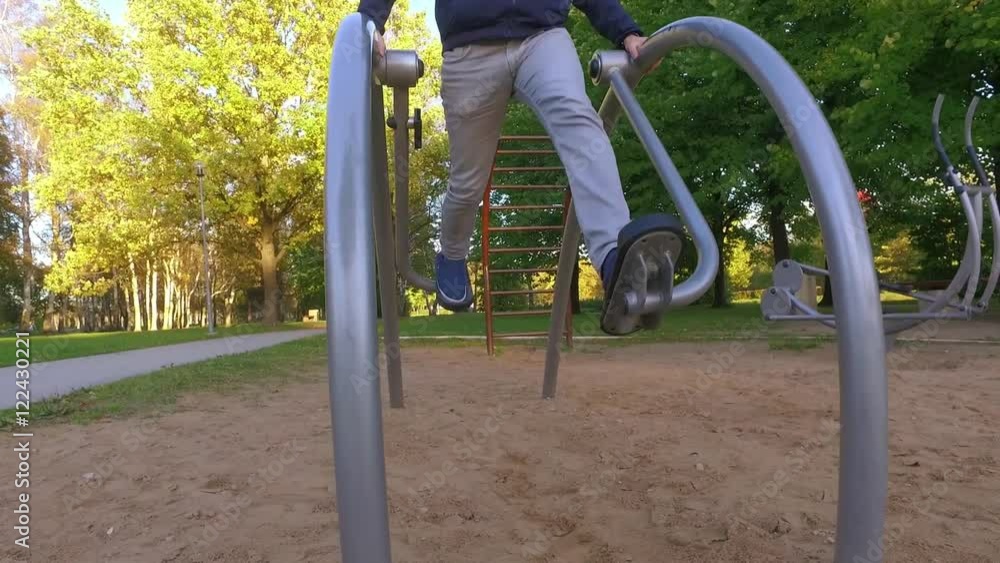Jogger exercising in park. Autumn park. Slow motion footage Jogger exercising in park. Autumn park. Slow motion footage