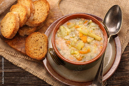 Autumn vegetable soup with toasts and space for text