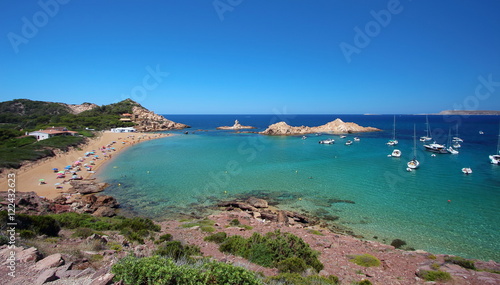 Main view of "Pregonda" beach, one of the most beautiful spots in Menorca, Balearic Islands, Spain.