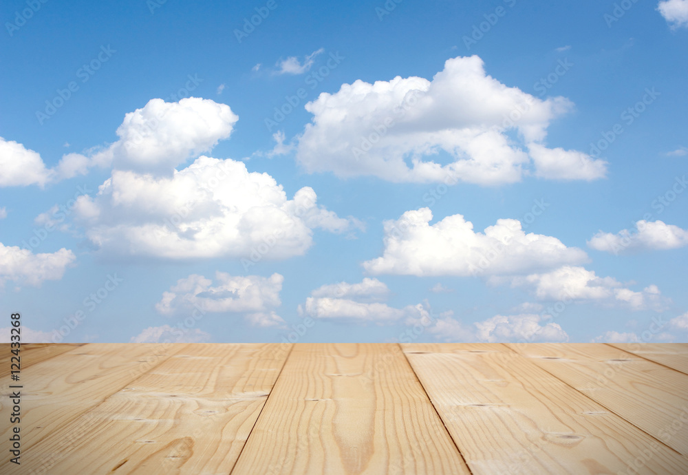 Blue sky background with wooden planks