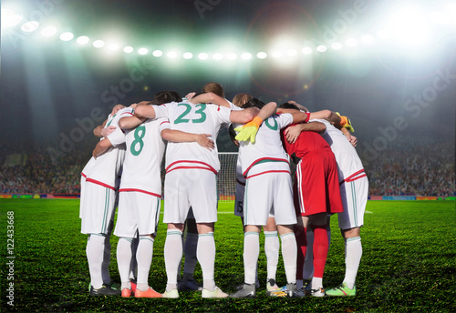  Football team players Hug the neck and for pray before playing © Vitaly Krivosheev