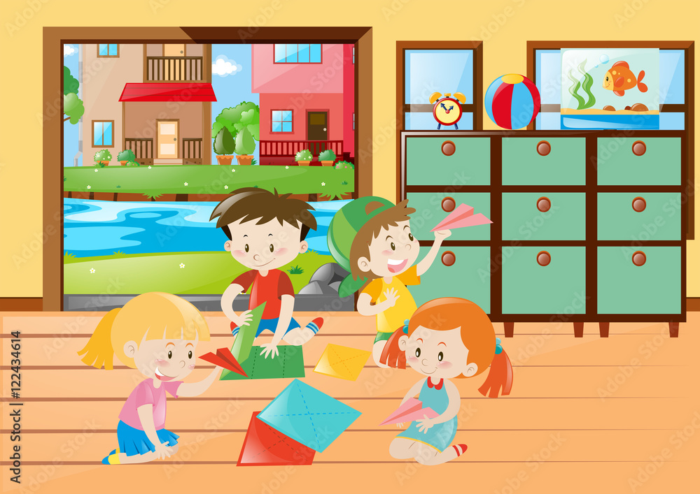 Children folding paper airplane in living room Children folding paper airplane in living room