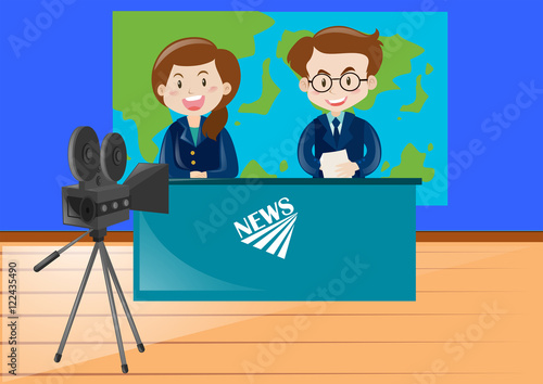 Two news reporters working at the studio