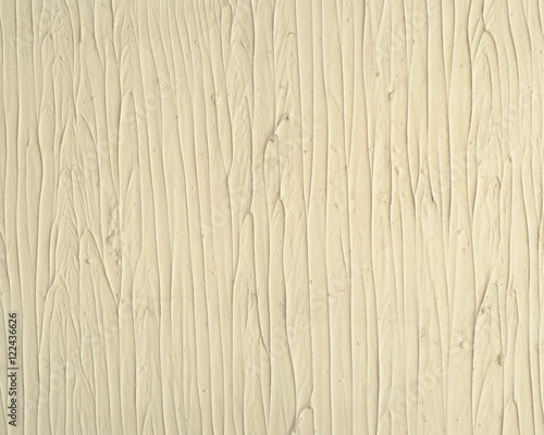Bright decorative plaster wall texture. Vertical waves shape