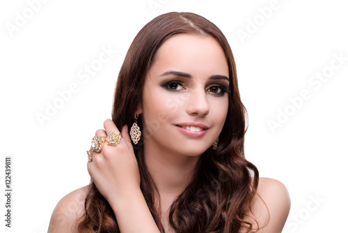 Beautiful woman showing off her jewellery in fashion concept iso