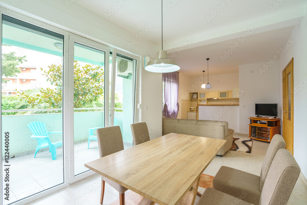 Fototapeta premium Interior of a guest house kitchen with dining zone