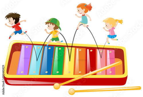 Children jumping on giant xylophone
